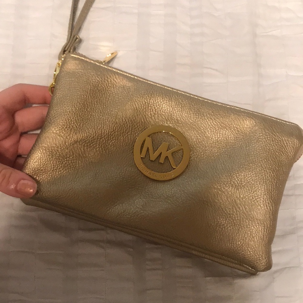 Michal kors gold handbag/ wristlet